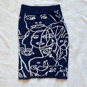 Abstract Face Pattern Navy Skirt